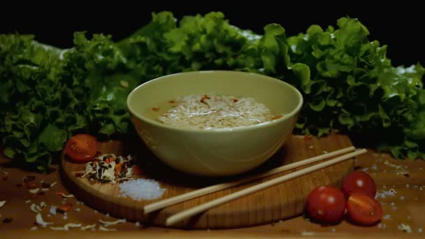 Noodles with dried vegetables prepare. Close up. Time-Lapse. — Stock Video