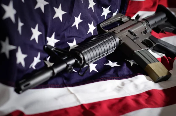 Flag of the USA with rifle — Stock Photo, Image