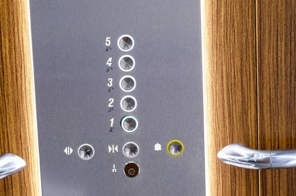 Close-up of elevator buttons panel inside the elevator.