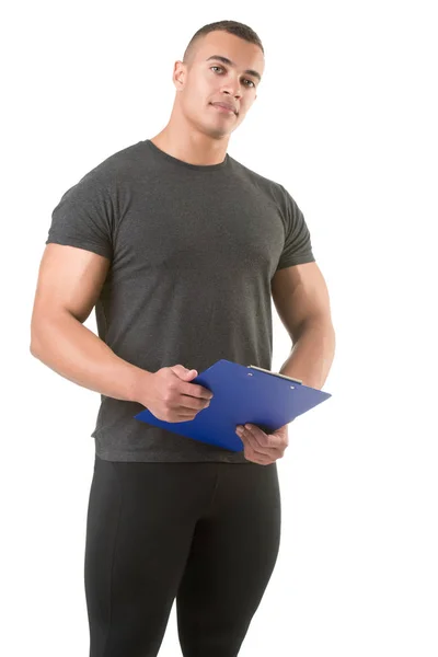 Personal Trainer Holding a Pad — Stock Photo, Image