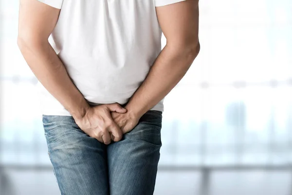 Man in Need to Urinate — Stock Image Man in Need to Urinate Stock Photo