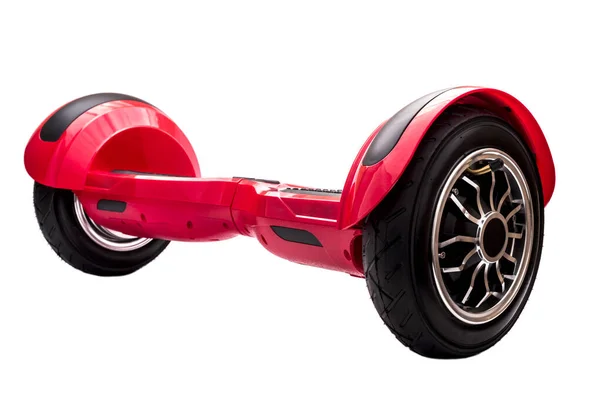 Self-balancing two-wheeled board or hoverboard scooter isolated on white background. Gyroboard: red gyroboard on white background. New movement