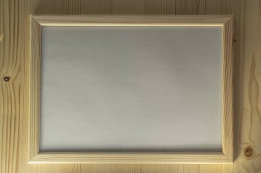 Ahşap arka planda ahşap çerçeve