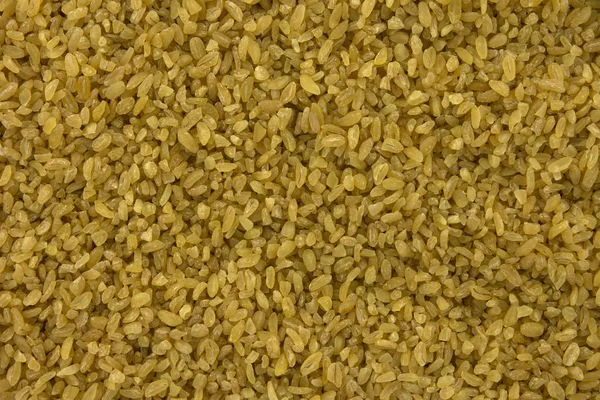 从上面的干碾碎的干小麦的背景 — 图库照片