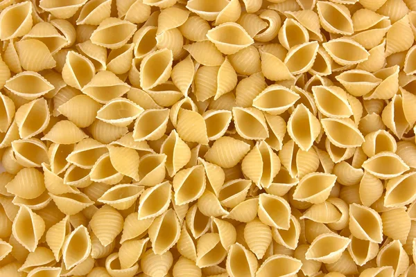 Macarrão italiano close up fundo — Fotografia de Stock