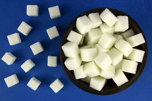 Terrones de azúcar en una olla —  Fotos de Stock