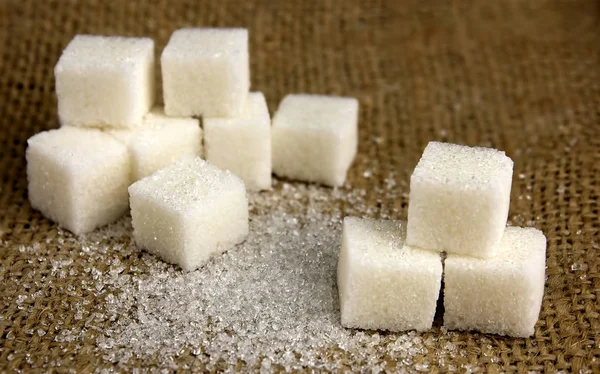 Los terrones de azúcar sobre el saqueo —  Fotos de Stock