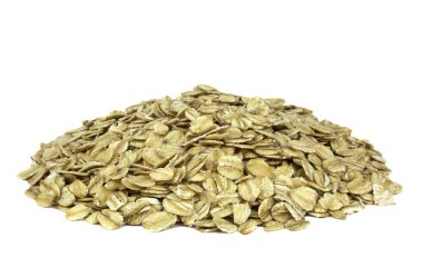 Beyaz arka plan üzerinde kuru yulaf gevreği