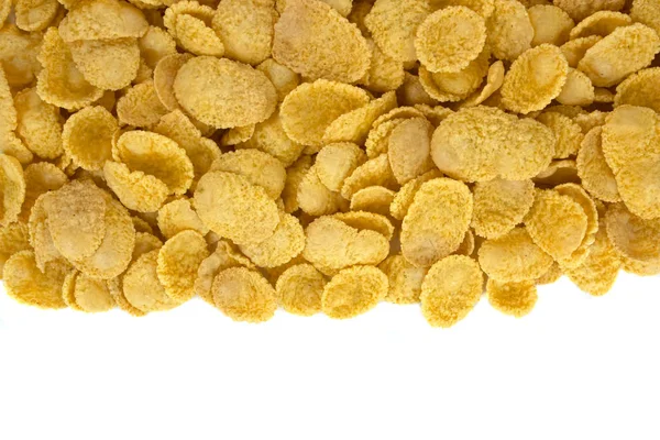 Copos de maíz vista superior sobre fondo blanco — Foto de Stock