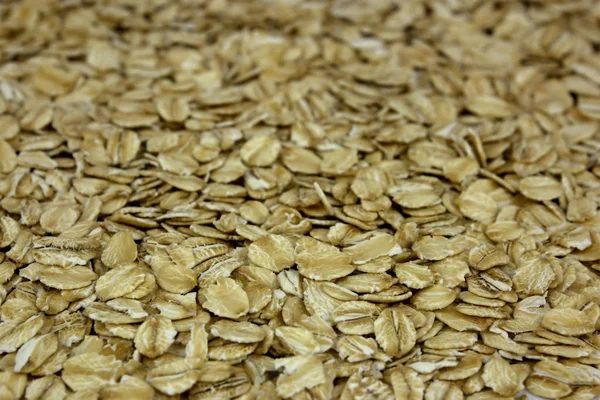 Oat flakes as background — Stock Photo, Image