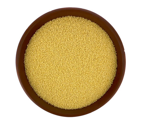 Couscous into a bowl isolated in white background