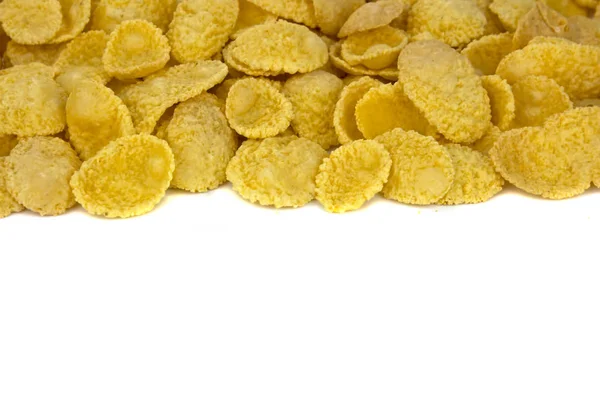 Copos de maíz vista superior sobre fondo blanco — Foto de Stock