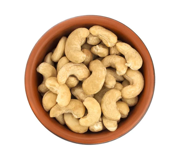 Cashew у мисці вид зверху на білому тлі, здорова їжа — стокове фото