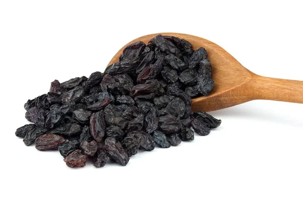Raisin on wooden spoon isolated over white background — Stock Photo, Image