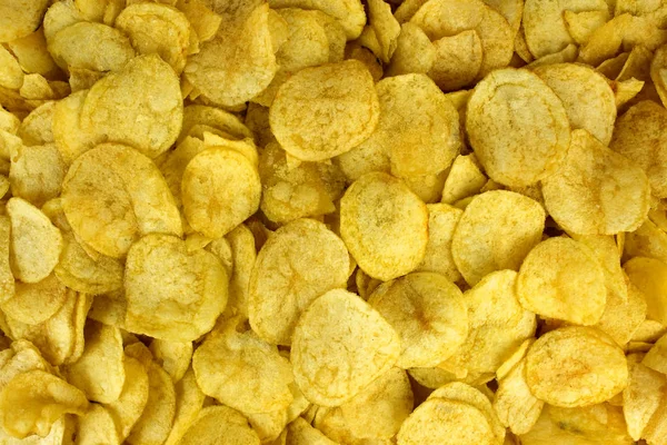 Batatas fritas textura fundo, vista superior — Fotografia de Stock