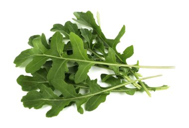 Beyaz arkaplanda taze roka yaprakları