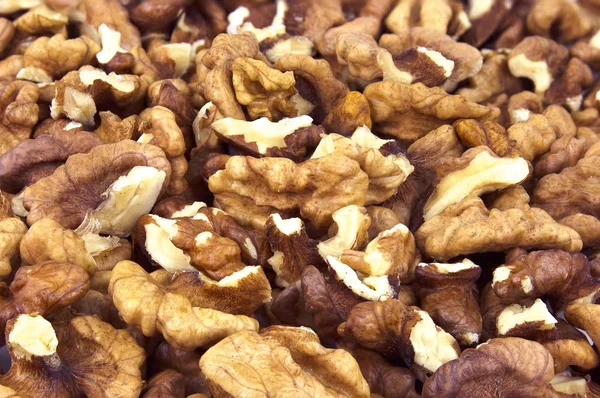 Shelled walnuts background — Stock Photo, Image