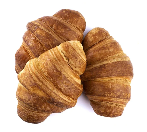 Deliziosi croissant su sfondo bianco — Foto Stock