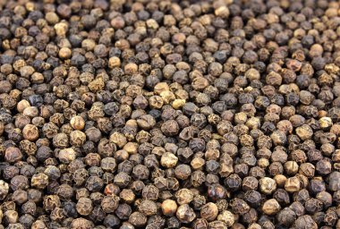 Siyah biber tohumları arka plan. Makro çekim