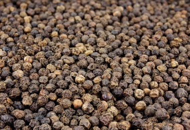 Siyah biber tohumları arka plan. Makro çekim