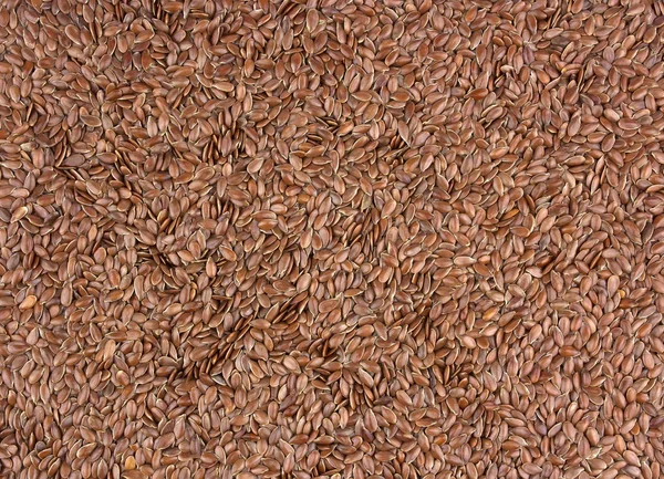 Flax seeds as natural background. Also known as Linseed, Flaxsee — Stock Photo, Image