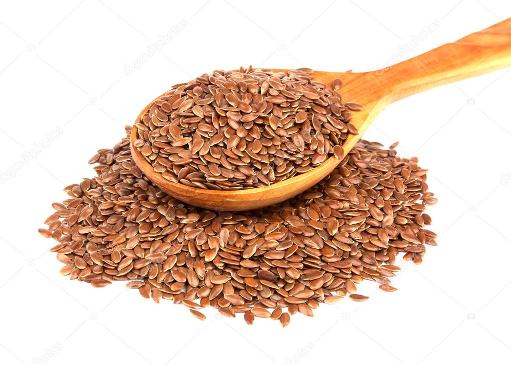 Flax seeds in wooden spoon isolated on white background 