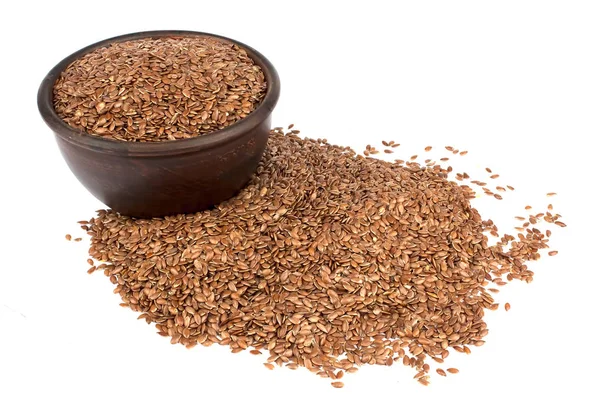 Flax seeds in ceramic bowl isolated on white background. — Stock Photo, Image