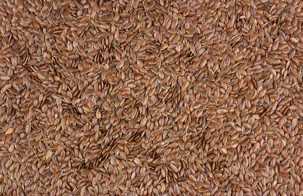 Graines de lin comme fond naturel. Également connu sous le nom de Lin, Flaxsee — Photo
