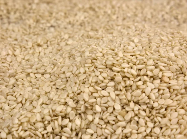 Fundo de sementes de gergelim branco — Fotografia de Stock
