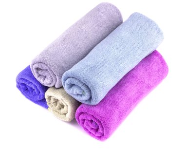 Soft clean color of bath towel isolated on white background