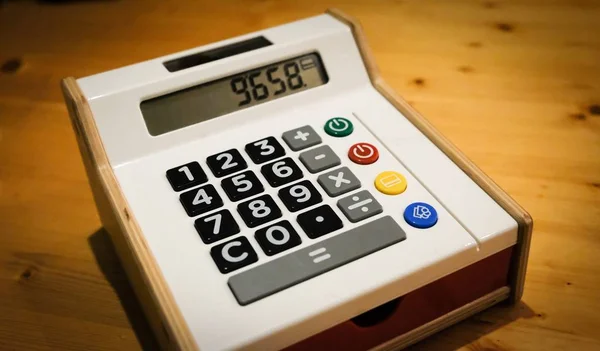 Калькулятор игрушки отображения кассовый аппарат — стоковое фото