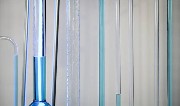 Tubi di vetro con liquido blu — Foto Stock