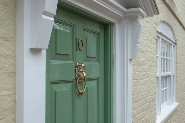 Frontdoor of english mansion in london great brittain