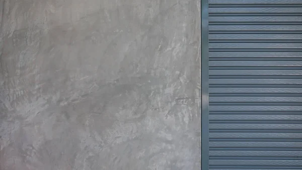 Cementy s válečkem závěrky dveře — Stock fotografie