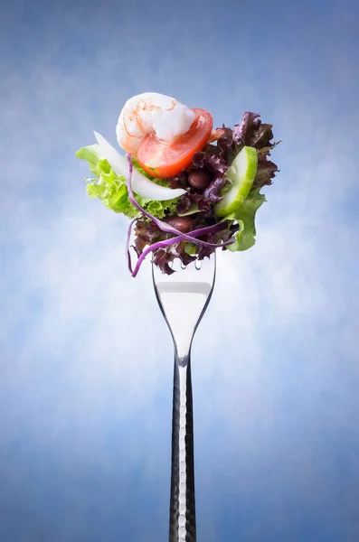 Küçük salata çatalı üzerinde