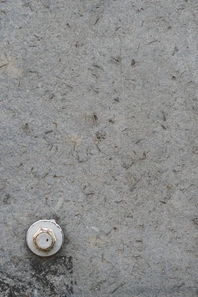 Gri beton doku arka plan duvar kağıdı için bir beyaz cıvata ile