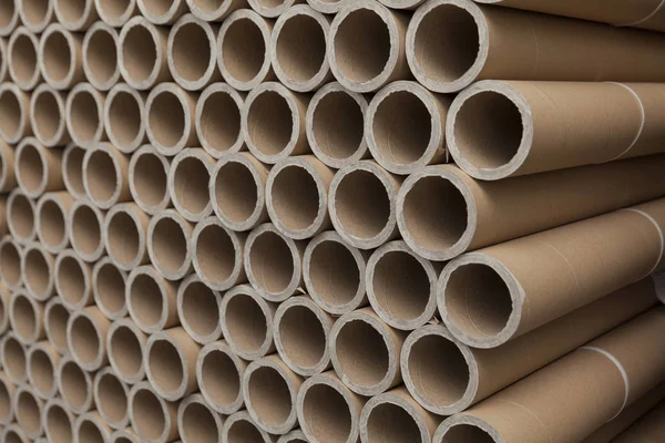 Cardboard tubes on stack