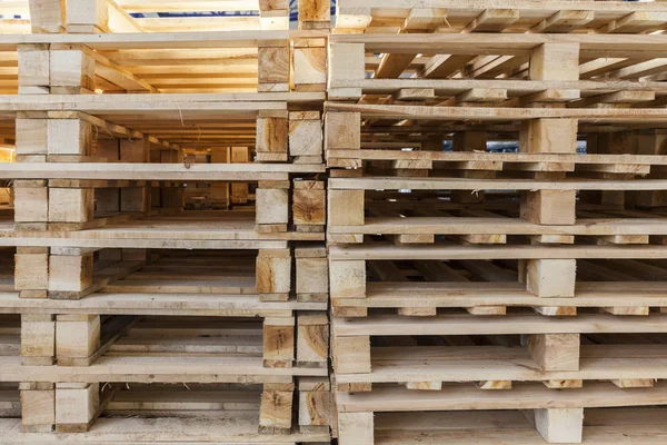 On a pile of wooden pallets — Stock Photo, Image