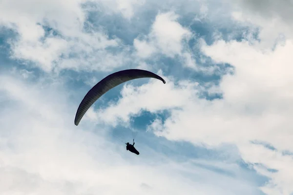 Paraglider on dramatic sky — Stock Photo, Image