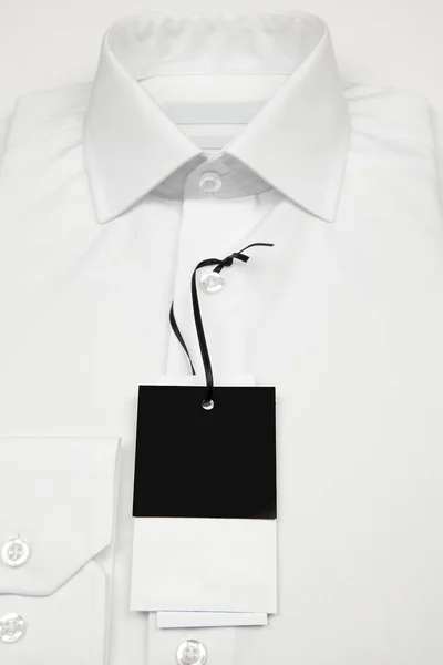 ラベルと白いシャツ — ストック写真