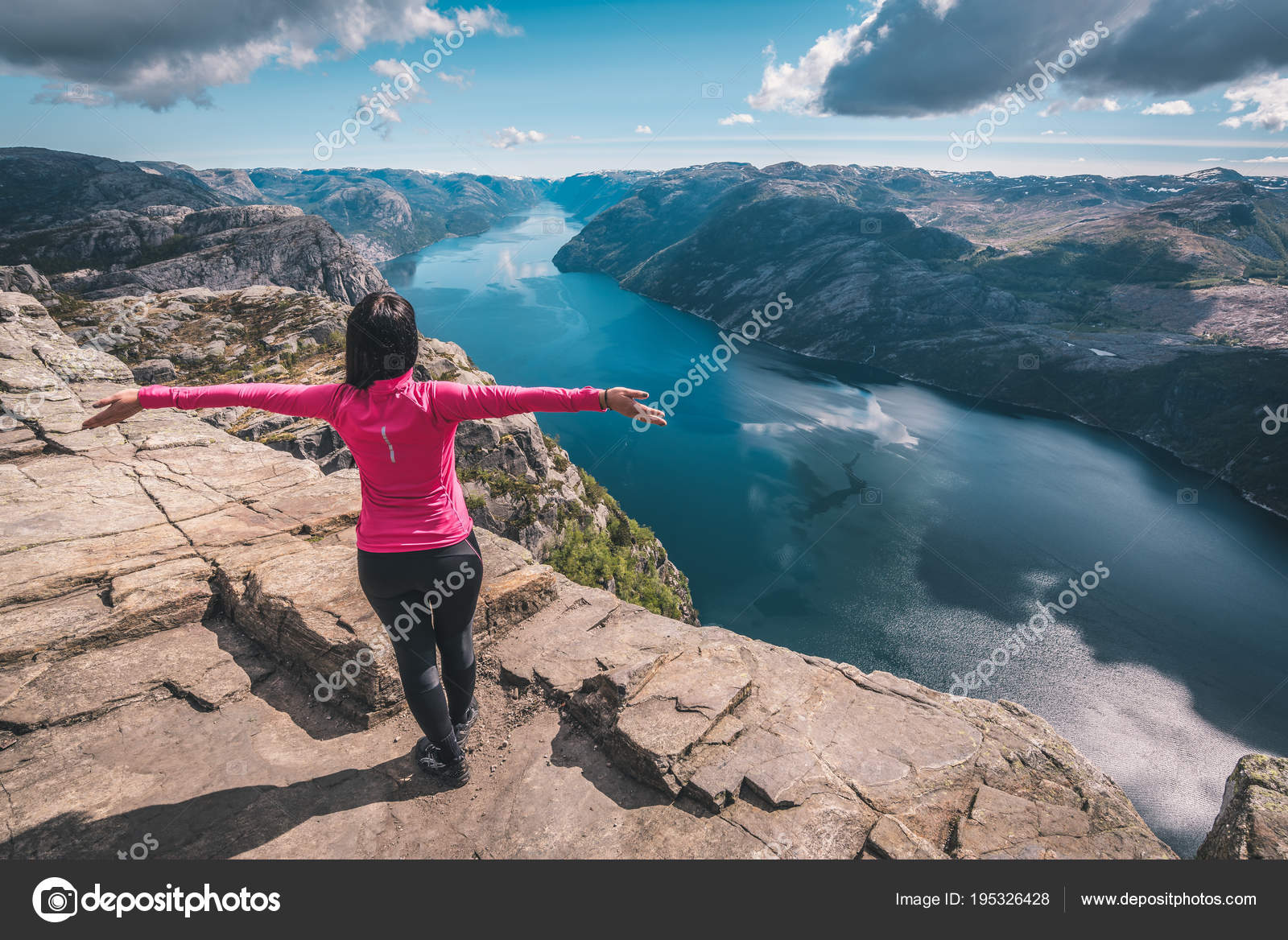 https://st3.depositphotos.com/11708687/19532/i/1600/depositphotos_195326428-stock-photo-young-woman-standing-edge-beautiful.jpg