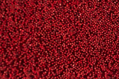 Kırmızı bir arka plan üzerinde kırmızı doku bokeh