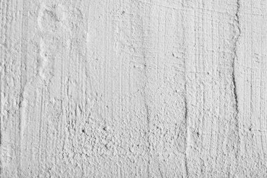 Düz olmayan bir yüzeyde beyaz alçı dokusu