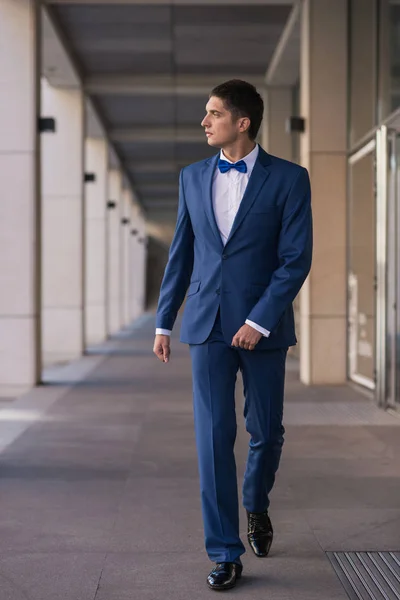 Man in blue suit