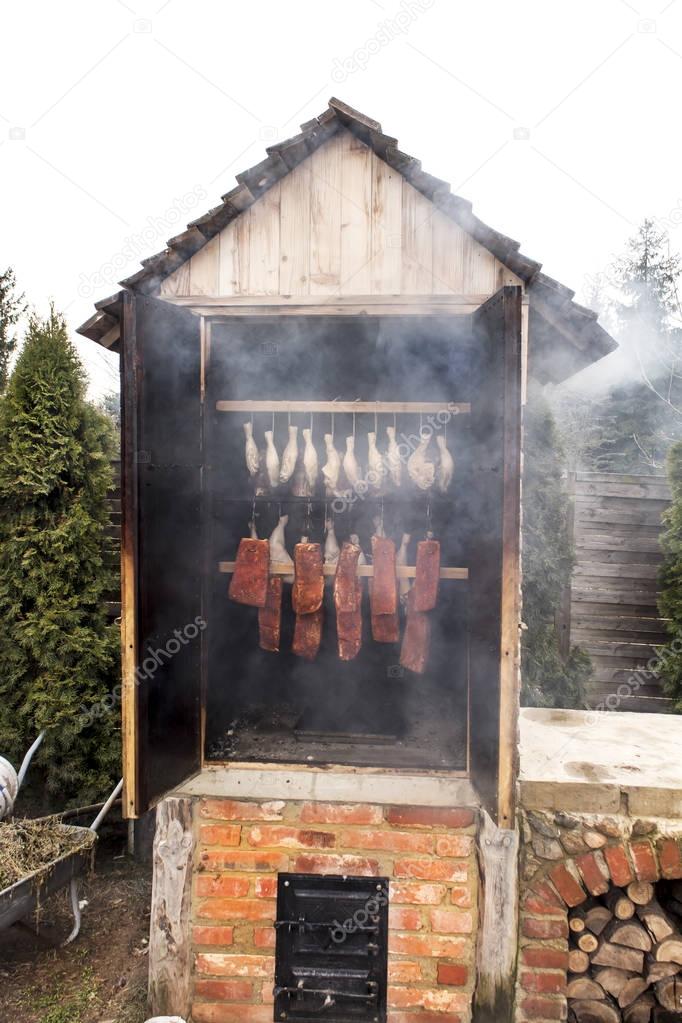 Raw meat in a smokehouse. 