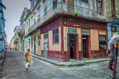 Havana, Cuba, July 2019, urban scene by a food store at the corner of Calle Muralla & Cuba in the oldest part of the city