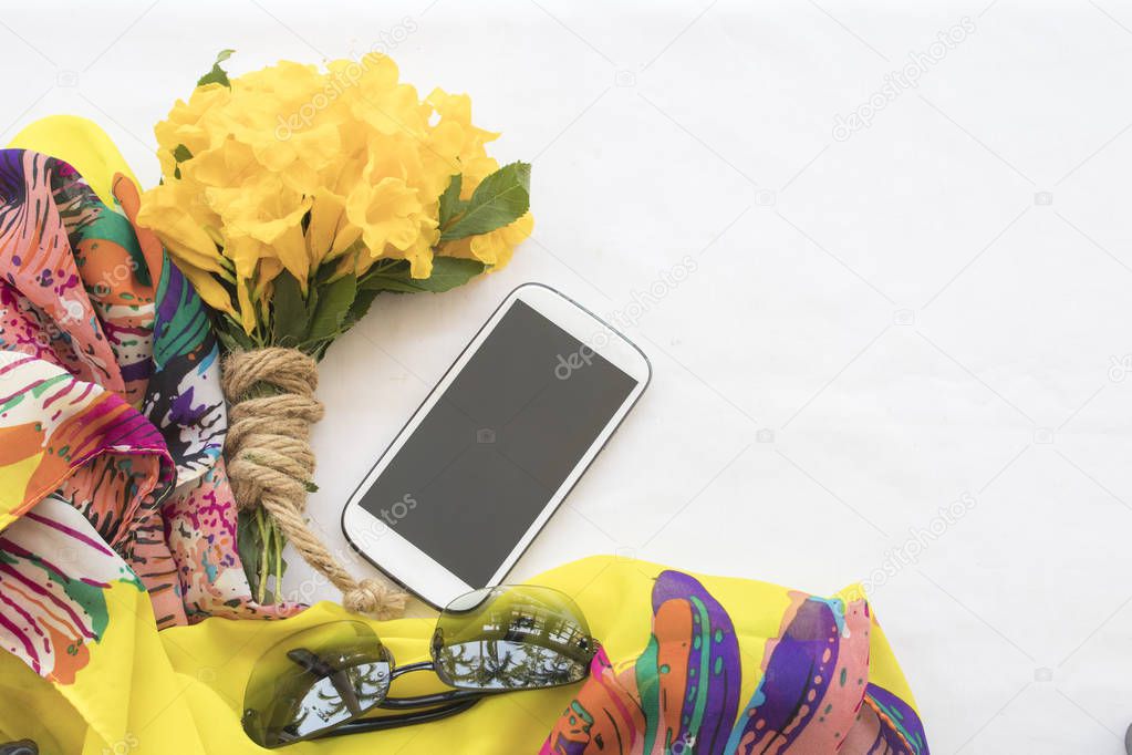 colorful bouquet flowers with mobile on background white