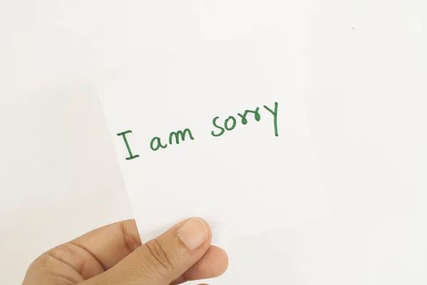 Hand holding i am sorry message card — Stock Photo, Image