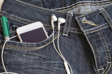 dokulu arka plan kot pantolon denim kumaş ve cebinde Cep