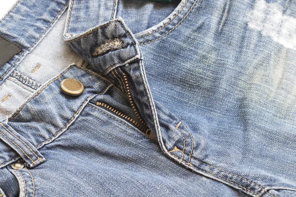 Bakgrunden texturerat dragkedja jeans byxor denim tyg — Stockfoto